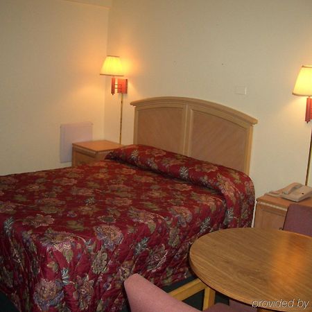 Travelers Inn Гейнсвилл Номер фото